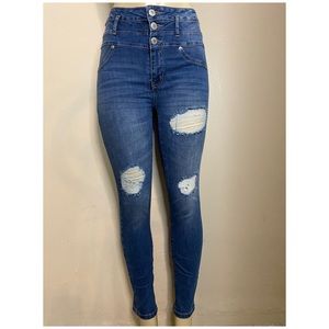 Classic Ripped jeans with extra buttons.